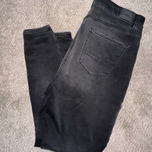 American Eagle black soft knit 10 short distressed jeans black